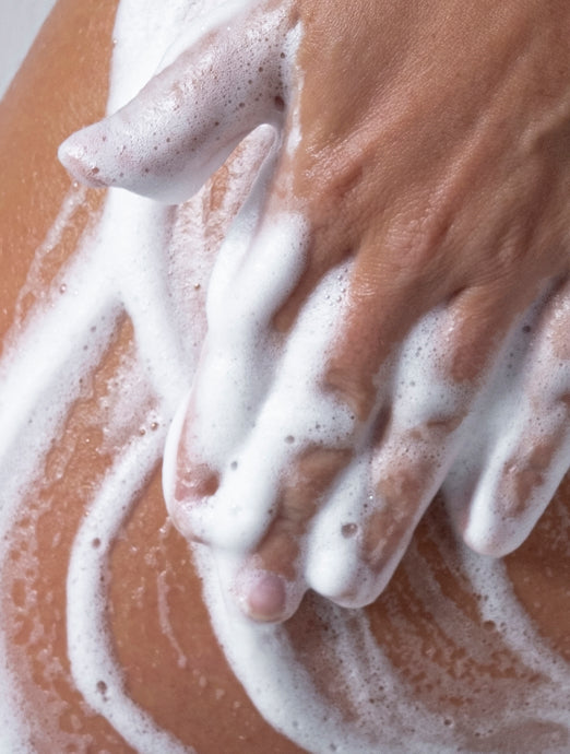 AMBRE amber vanilla wash lathered between hands