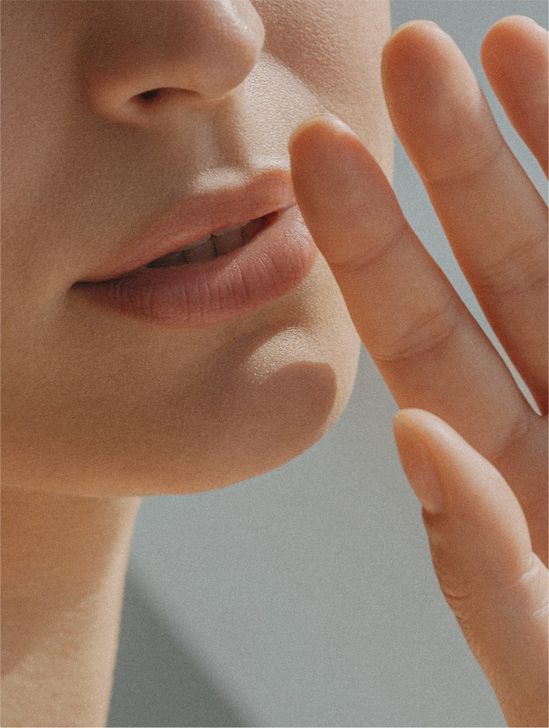 LUMINA oil-to-milk cleanser applied to the face